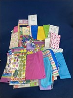 Assorted tissue paper, gift bags, Easter bags and