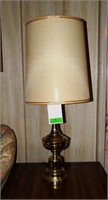 Table lamp with shade and gold trim, works