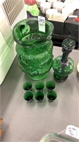 Green glass pitcher, decanter and shot glasses