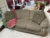 Fabric Couch W/ Decorative Pillows & A Throw