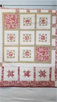 QUILTED THROW BY CLAIR MCCALDEN