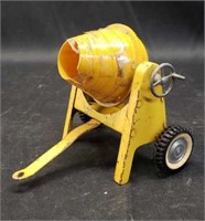 Beautiful vintage yellow metal cement roller toy
