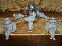 Assorted porcelain & ceramic cherubs (10)