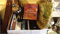Box lot of books with a Wilson baseball glove