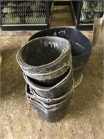 7 Black Feed Buckets & 1 Black 1/2 Barrel