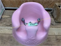 Bumbo baby seat with buckles
