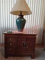 End table with contents and lamp