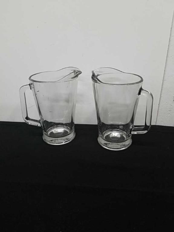 Two glass pitchers