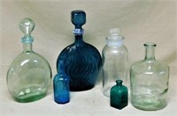 Glass Decanters, Lidded Jar and Bottles.