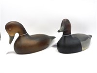 (2) carved and painted decoys by Holger Smith,