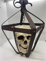 Rusted Metal Cage Human Skeleton Skull