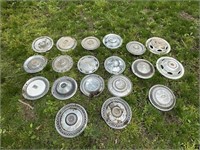 23 vintage metal hubcaps