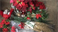 Faux poinsettia, pinecones, and floral Christmas