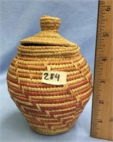 Approx. 6" handmade, lidded grass basket    (a 7)