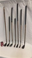 Selection of antique golf clubs