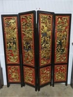 An Extensively Carved Asian Four Panel Screen