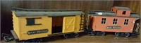 Two plastic railroad cars, Caboose and stock,