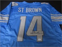 Aman-Ra St Brown signed football jersey COA
