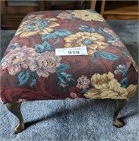CAST BRASS FOOTED UPHOLSTERED STOOL