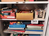 Two shelves with card games - Hoyle books -