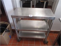 14" X 30" S/S TABLE ON WHEELS