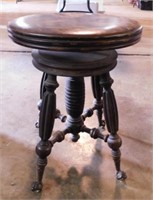 Antique walnut piano stool w/ claw & glass ball