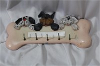 A Dog and Bone Wall Hanger