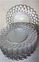 Approx 12 saucers with cobblestone pattern