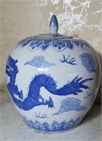 Approx 10 inches tall oriental jar with lid