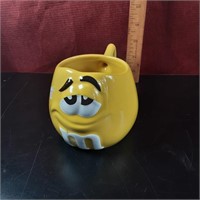 Yellow M&M coffee mug
