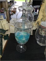 glass lidded jar 17" tall with blue glass chips