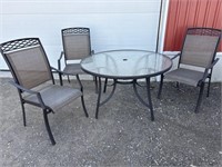 Pound patio table and 3 chairs