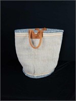 Large heavy woven hamper with leather handles $37p