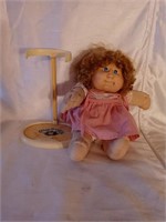 Cabbage Patch doll with stand