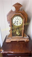 Antique kitchen clock in walnut case