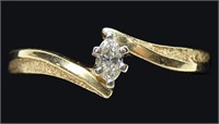 10K Yellow gold marquise cut diamond solitaire