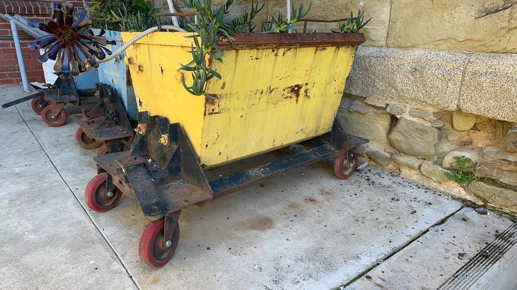 2 CAST IRON COAL CARTS WITH PLANTS