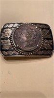 1887 Silver Dollar in a belt buckle