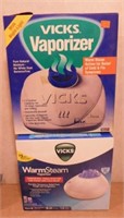 2 Vicks warm steam vaporizers in boxes