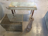 Small weathered bench, metal animal cage