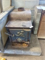 Woodland cast iron stove heavy bring help to load
