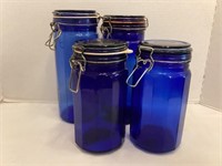 4 Blue Glass Organizing Canisters with Locking Lid