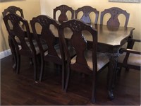 Dining room table with eight chairs