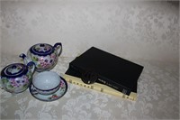 Tea set and books