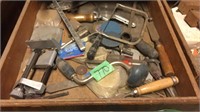 Drawer full of saws, chisels and more
