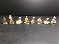 Red Rose Tea Figurines. Some have writing on