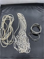 PEARL-ESSENCE-NECKLACES AND TWO BRACELETS