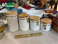 lot of white kitchen canisters