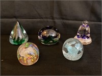 St cailr and assorted paperweights