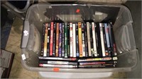 30 DVDs in a tub with a lid